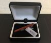 Picture of Red wood grain tie clip